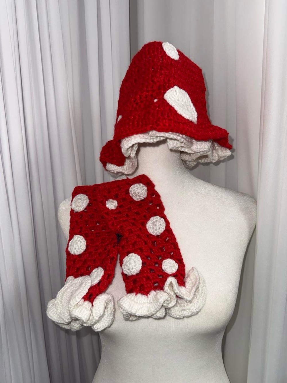 Red and white crochet mushroom hat and arm warmer set
